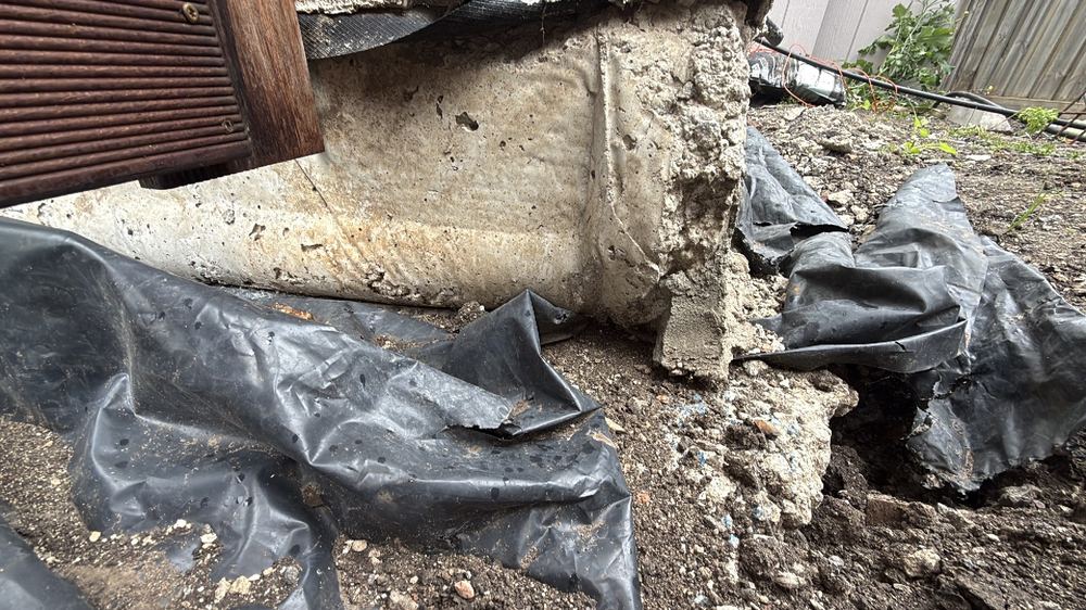 Gap between a bored pier and the underside of the slab it supports, found during a defect investigation in Herne Hill