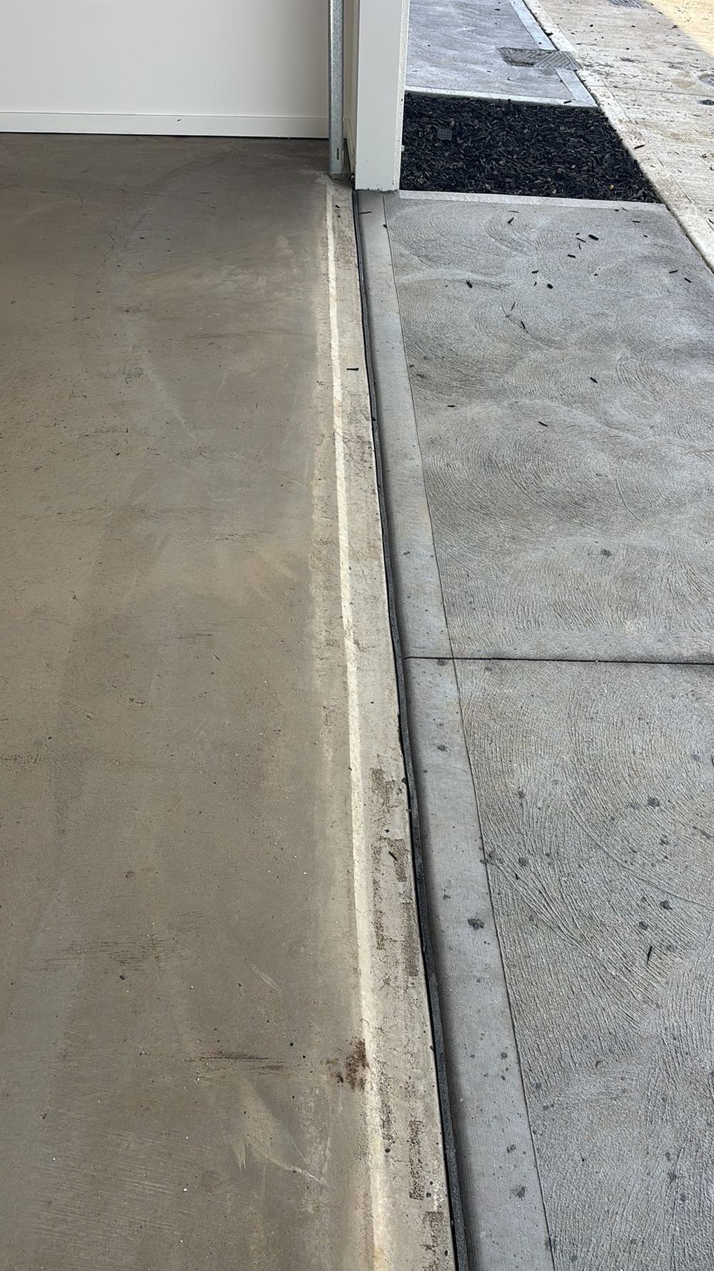 Grading, downpipes and joints: closing the water paths at handover