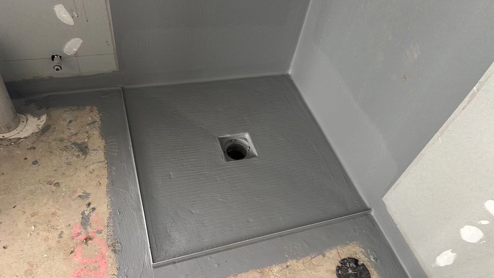 Membrane left open to damage before tiling and needing protection, found during a waterproofing inspection in Thornhill Park
